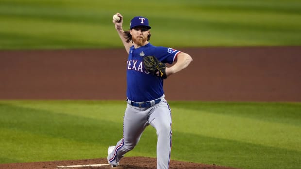 Texas Rangers relief pitcher Jon Gray pitches in the fifth inning against the Arizona Diamondbacks in Game 3 of the 2023 World Series at Chase Field.